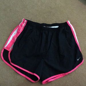 Black Nike running shorts